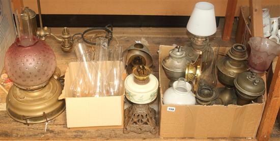 Collection of oil lamps & shades